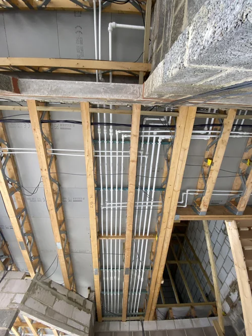 First-fix plumbing pipework rising through timber stud walls — plumber Basingstoke