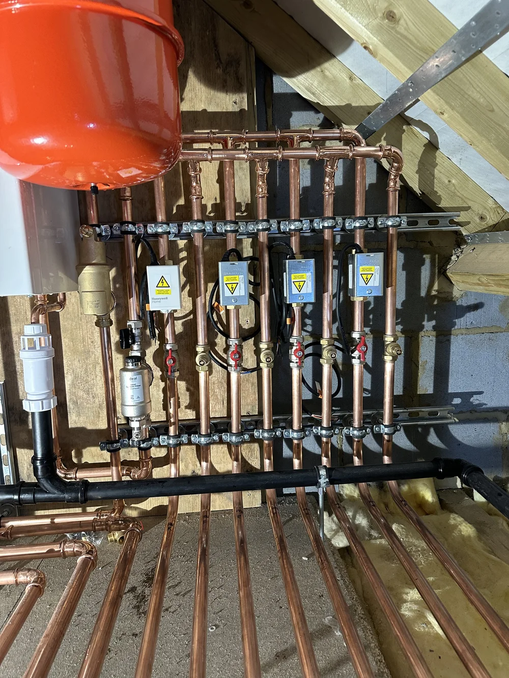 Copper manifold with zone valves, filter and expansion vessel — heating and plumbing Basingstoke